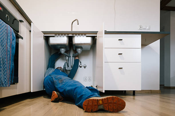 Professional Drain Cleaning technician working in Tate, GA